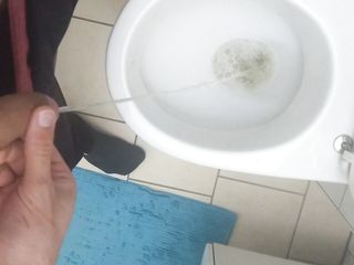 Guy Pissing After Work